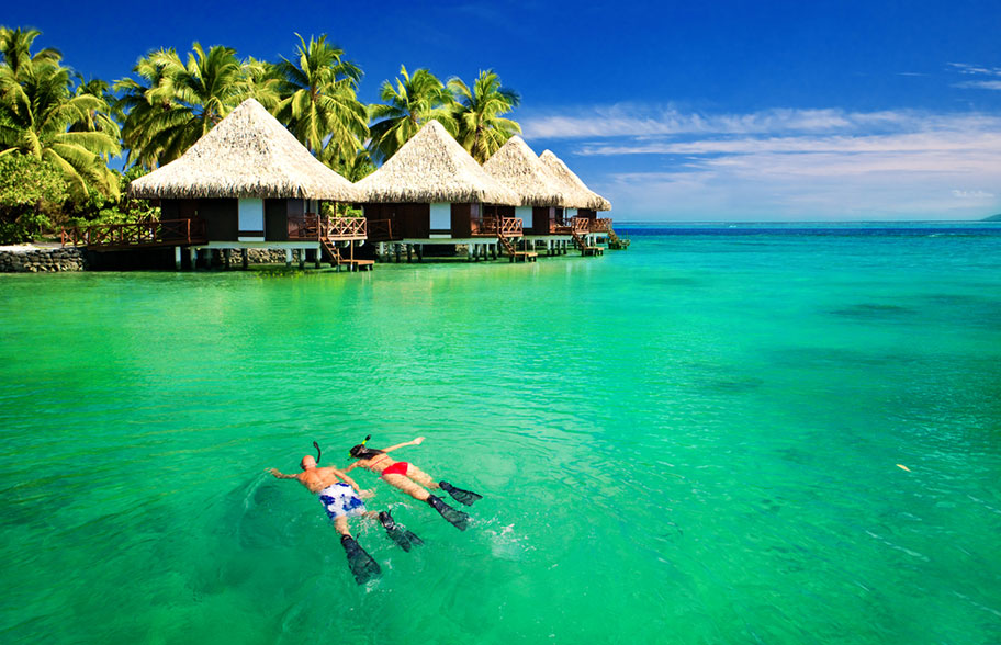 Malediven günstig Resort Wasserbungalows Schnorcheln 